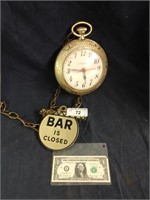 Vintage spartus pocket watch clock bar is open