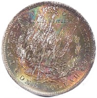 Rainbow Toned 1885-O Morgan Dollar.