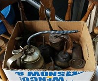 Box of Antique Oil Cans