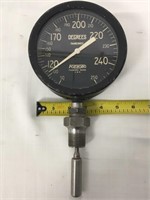 Large vintage industrial thermometer.
