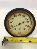 Large vintage thermometer.