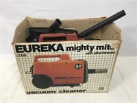 Eureka Mighty Mite vacuum.