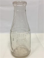 Unique vintage 5 cent milk bottle.