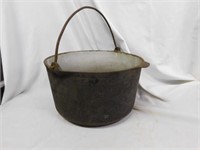 A.G.P. cast iron pot with bail handle