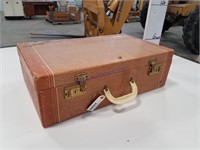 Tan suitcase