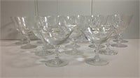 11 glass wine glasses and 5 etched glass