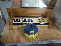 U of M decorative wall shelf and coin Bank
