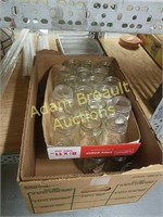 Assorted Mason and Ball canning jars
