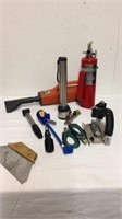 Group of tools includes fire extinguisher