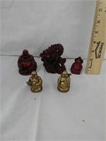 Miniature Buddha and dragon statues