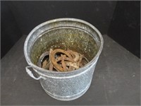 C- BRASS POT AND HORSE SHOES