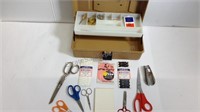 Vintage sewing box full of needles, thimble,