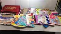Large collection of gift bags and tissue paper,