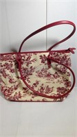 Toile design handbag with red leather accents