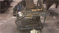 Mobile metal cart of miscellaneous items