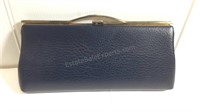 Blue leather clutch with gold accents on clasp
