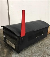Mail box mounted on wood