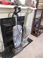 Two Oreck Vacuum Cleaners