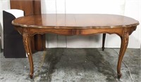 Ornate wood dining table w/ 2 leaves
