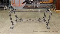 Glass topped metal table