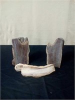 Petrified wood bookends and 1 additional piece