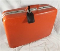 Vintage orange suitcase