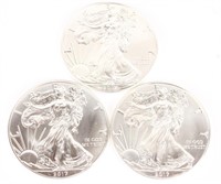 (3) AMERICAN SILVER EAGLE ONE OUNCE SILVER COINS
