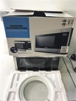 Samsung MG11H2020CT microwave new-dented