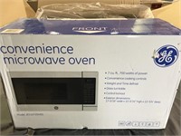GE microwave-dented-never used