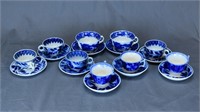 LOT OF 9 FLOW BLUE CUPS & SAUCERS