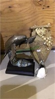 Bronze wale statue, glass penguin, sand &
