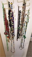 Group of beaded necklaces including Shells, stone