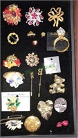 Group lot of costume jewelry brooches, pins and