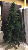 7 1/2 foot pre-lit Christmas tree with about half
