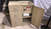 Locking file cabinet with three drawers,