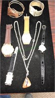 Five watches, bangle bracelet with wood, stone
