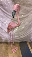 Pink flamingo 51 inches tall made of some kind of