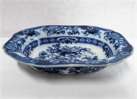 Flo blue oval bowl 10 X 7.5"(chip on rim)
