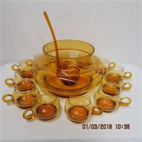 Amber glass punch bowl, ladle and 12 cups,