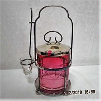 Cranberry cut glass pickle cruet in silver frame