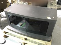 Black media console with glass doors used
