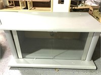 Media console with glass doors-scratches present