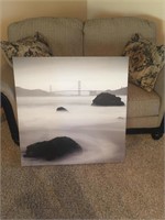 Decorative picture of the Golden Gate bridge appr"