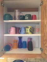 Contents of kitchen cupboards cups and mugs