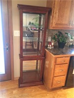 Curio cabinet with glass shelves