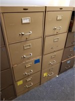 (2) metal filing cabinets