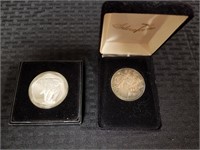 (2) 1 oz. silver rounds