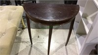 Half circle side table with brass rosettes, 28