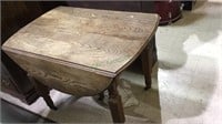 Antique oak drop leaf table, opens in the center