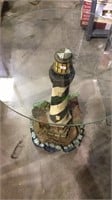 Unusual glass top lighthouse sized table, large